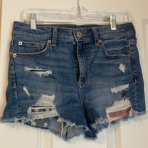 American Eagle high rise shorties size 6 with American flag pocket details.